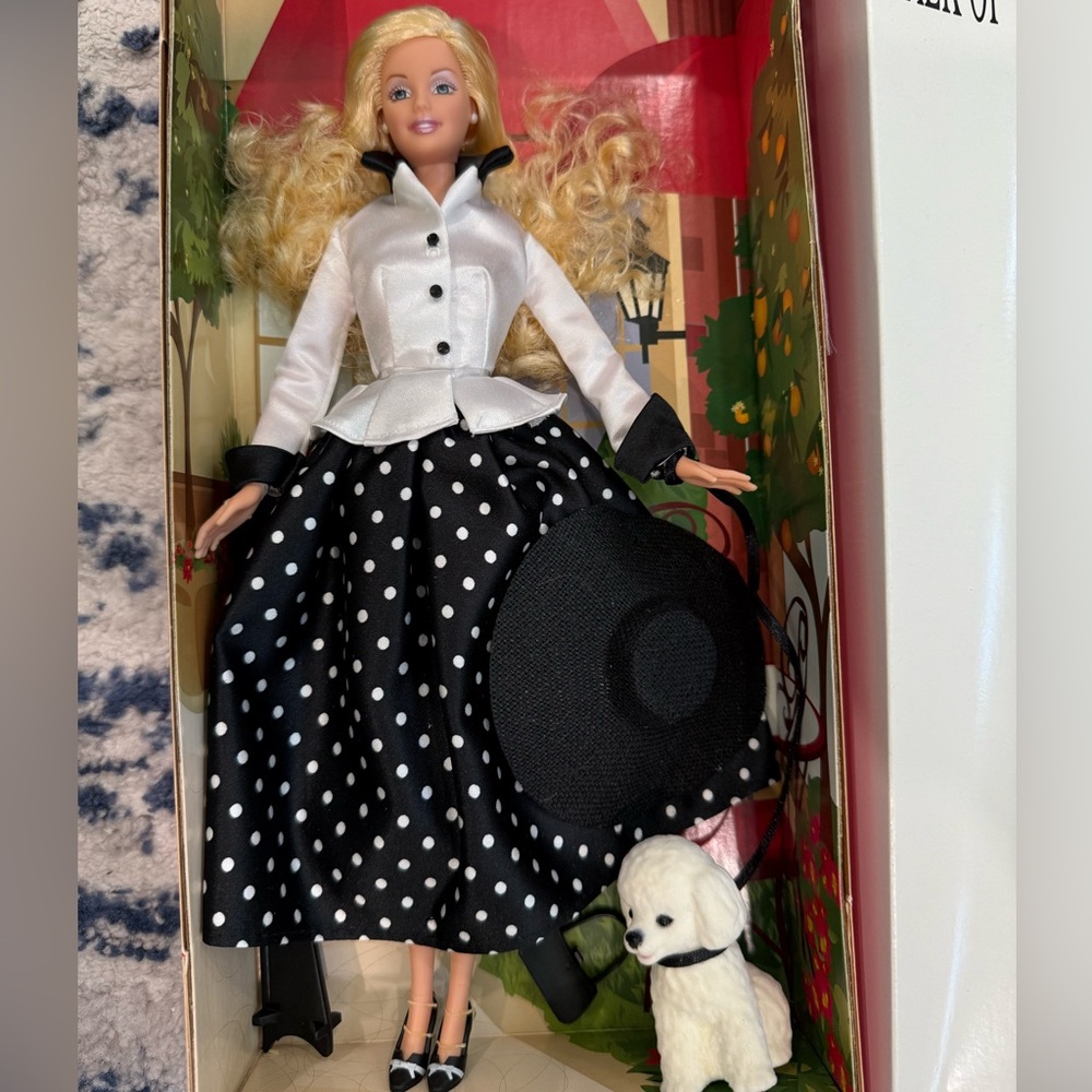 Elegant Doll with Polka Dot Skirt and Hat